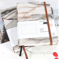 Notebook in pelle tagliata a riviste riciclate logo personalizzato